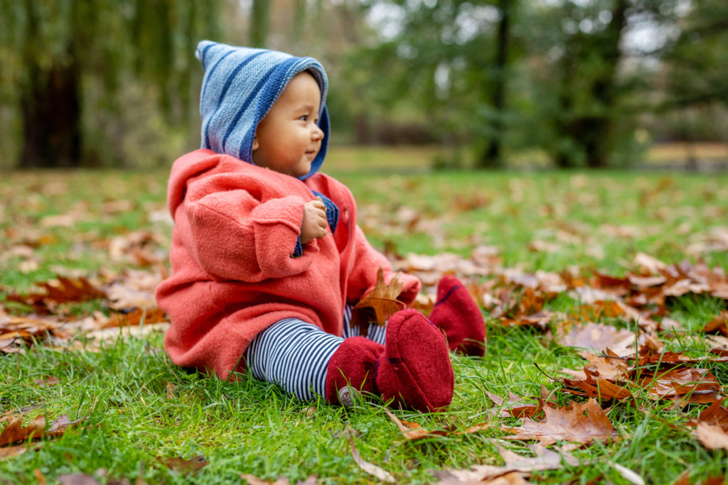 Poduktfotos mit Baby und Grims Kind Schuhe